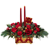 Miami Christmas: A wonderful holiday mix of red carnations and roses, gold pinecones, gold glass balls and seasonal greens surrounding burgundy taper candles. Its all beautifully presented in a footed metal planter silkscreened with a baroque pattern in burgundy and gold metallic. 8"W x 4"D x 4 1/4"H. Set includes planter, two candles... ORDER NOW 